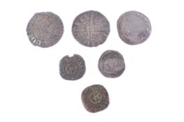 A collection of six silver hammered coins.