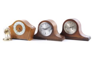 Four assorted 20th century mantel clocks. Including two oak cased Napoleon hat clocks, etc. Max.