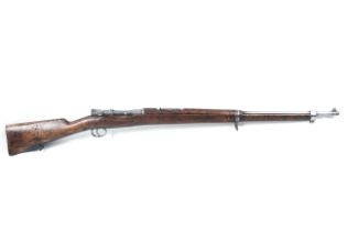 A Mauser model 1898 7mm calibre bolt action rifle.