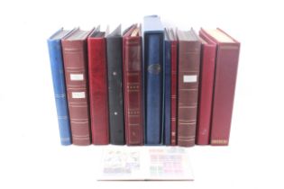 A collection of worldwide stamp albums and stock books.