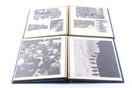 Two albums of WWII photographs.