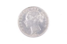 A Queen Victoria half crown coin.