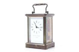 A Swiss made brass five glass carriage clock circa 1900. Retailed by Matthew Norman, London.