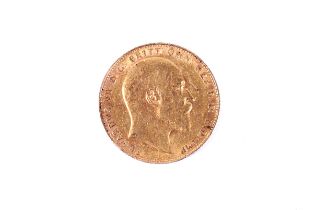 An Edward VII full sovereign coin. Dated 1909, 7.