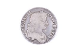 A Charles II silver crown coin.