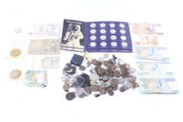 A collection of world coins and bank notes.