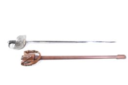 A George VI officers dress sword in a brown leather scabbard.
