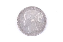 A Queen Victoria crown coin.