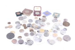 An assortment of 20th century and later medallions and coins.