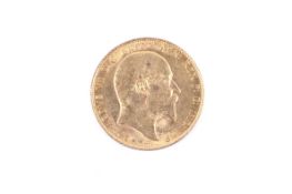 An Edward VII full sovereign coin. Dated 1907, 7.