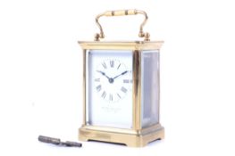 A 20th century French brass five glass carriage clock.