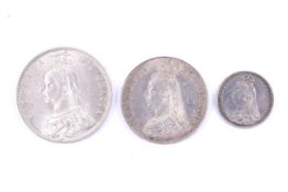 A collection of three 19th century silver coins. Comprising a 1887 half crown, florin and sixpence.