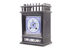 A Victorian 'Aesthetic' 8 day chiming mantel clock.