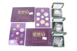 A collection of 20th century proof coins.