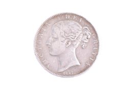 A Victorian Crown coin.