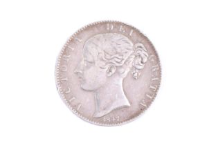 A Victorian Crown coin.