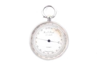 A 19th century white metal cased pocket aneroid barometer altimeter.