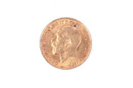 A George V full sovereign coin. Dated 1913, 7.