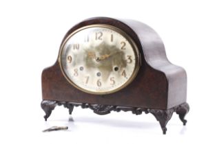 A 20th century arch top Westminster chiming mantel clock.