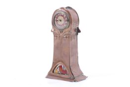 An Arts and Crafts mantel clock.