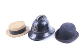 A group of three assorted vintage hats.