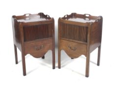 A pair of Georgian style mahogany bedside cabinets.
