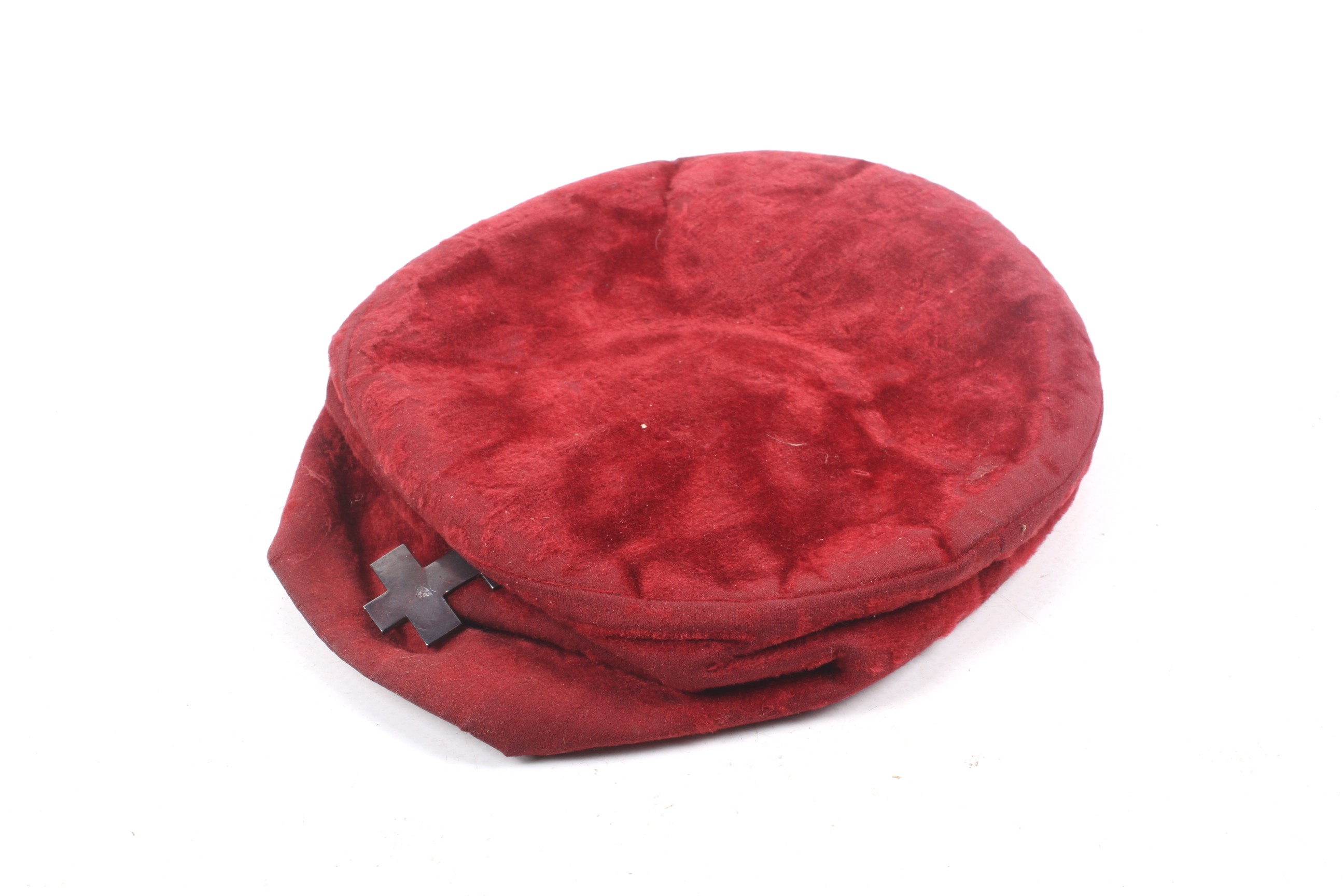 A Masonic red velvet cap.