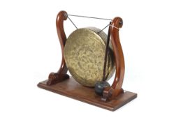 A 20th century brass dinner gong.