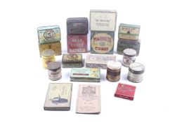 An collection of vintage advertising product tins mostly tobacco related.