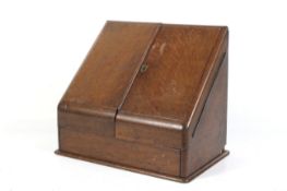 A mid-19th century oak stationary cabinet.