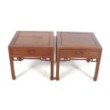 A pair of contemporay traditional hardwood Chinese style side tables.