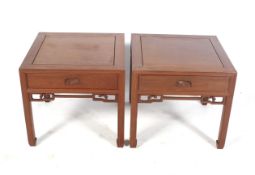 A pair of contemporay traditional hardwood Chinese style side tables.