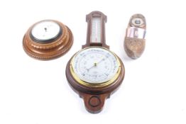 Three assorted Victorian and later aneroid wall barometers.