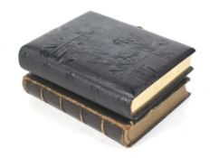 Two Victorian photograph albums.