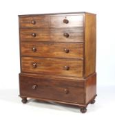 A 19th century tall mahogany straight front chest of drawers.