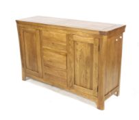 A contemporary solid blonde oak sideboard.