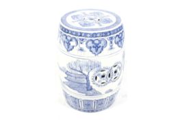A 20th century Chinese blue and white ceramic drum stool.