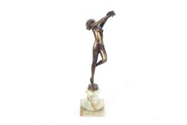 An early 20th century patinated bronze figure.