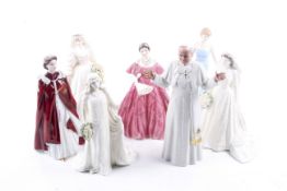 A collection of seven porcelain figures.
