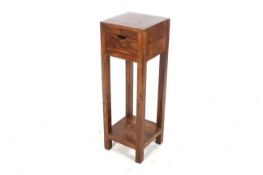 A contemporary hardwood stand with drawer L30cm x D33cm x H190cm