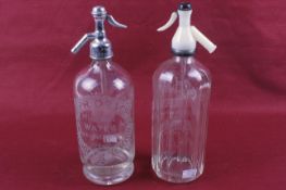 Advertising Soda Syphons: Two glass and chromed etc.