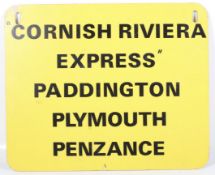 A double sided yellow 'Cornish Riviera Express' sign.