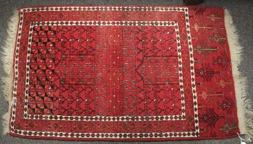 A Persian style woollen pray rug.