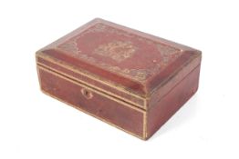 A 19th century red lather and gilt deeds box.
