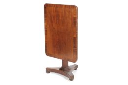 A Victorian mahogany and cross banded rectangular tilt top table.