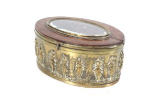 An embossed brass bound oval jewellery box casket.