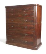An early 19th century mahogany two-part, six drawer chest or tall boy.