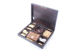 A 19th century veneered and brass marquetry games box compendium.