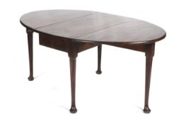 An 18th century mahogany oval drop leaf table with four pad feet. H71.5cm x L164cm x W102.
