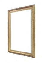 A contemporary gilt framed rectangular wall mirror. With bevelled edge glass.